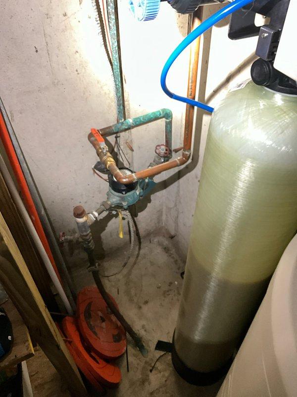 Completed comprehensive plumbing inspection as part of preventive maintenance tune-up service. Performed water hardness testing using Spectrum hardness solution to evaluate water quality and softener performance. Inspected water softener system including tank condition, control head operation, and all associated plumbing connections. Examined copper piping network, valves, shut-off assemblies, and pressure relief components for proper operation and signs of corrosion or wear. Documented equipment conditions through photographic records for maintenance history.