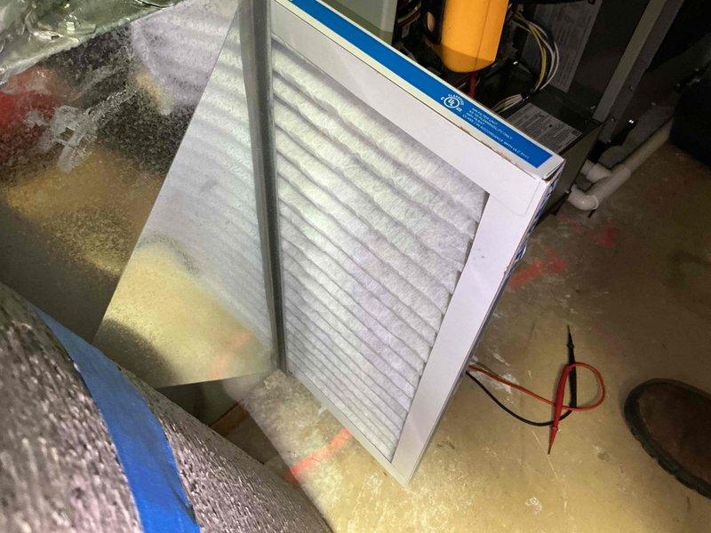 Completed comprehensive BFMA tune-up service on residential split HVAC system with equipment over 3 years old. Performed preventive maintenance on outdoor condenser unit including inspection of compressor operation, refrigerant levels, electrical connections, and condenser coil cleaning. Inspected indoor air handler components, replaced air filter with new pleated media filter, verified proper airflow, and tested system controls. Both heating and cooling systems evaluated for optimal performance with all components operating within manufacturer specifications.