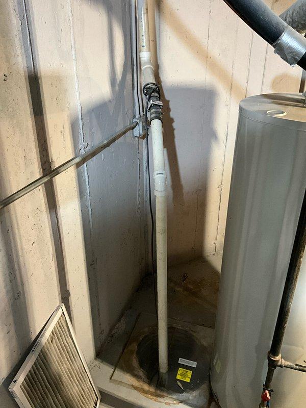 Completed comprehensive plumbing inspection as part of preventative maintenance tune-up service. Inspected water heater installation, PVC drainage system, and condensate lines in utility area, verifying proper mounting, connections, and operational condition. All plumbing components found to be functioning within normal parameters with no immediate repairs required.