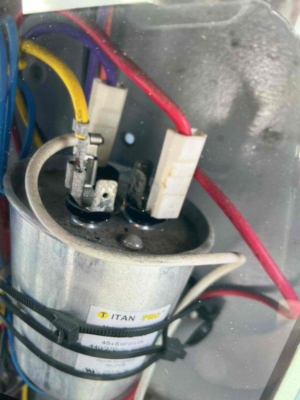Completed comprehensive BFMA tune-up on 6-year-old rooftop AC unit during afternoon service window per customer preference. Performed full system inspection including electrical components, verified TITAN PRO capacitor operation and connections, inspected evaporator coil showing moderate dust accumulation and minor oxidation on fins, and checked air filtration system. All components tested within operational parameters and unit returned to service.