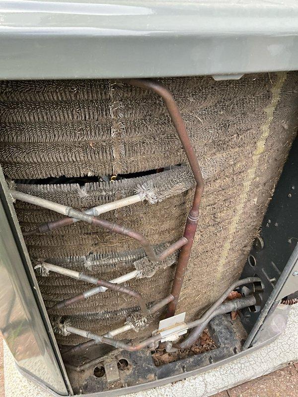 Completed comprehensive air conditioning tune-up on 19-year-old residential outdoor condensing unit. Performed standard maintenance protocol including system inspection, coil cleaning to remove heavy dust and debris accumulation from evaporator coils, and operational testing to ensure proper system performance for the cooling season.