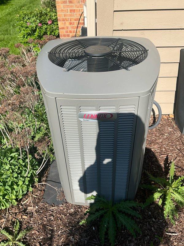 Completed comprehensive BFMA tune-up service on 6+ year old Lennox air conditioning system. Performed full system inspection, electrical diagnostics with clamp meter showing 118.8 amp reading, replaced air filter, verified proper refrigerant levels and airflow through condensing unit. All components operating within manufacturer specifications with no issues identified.