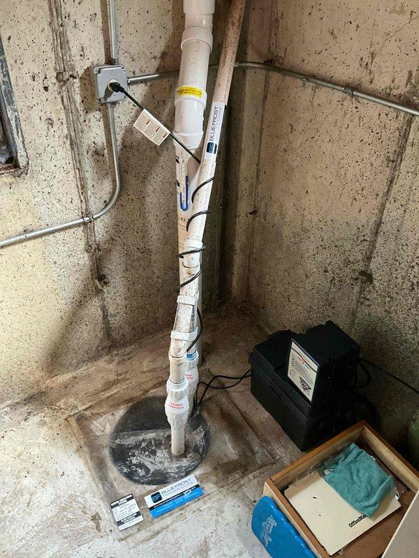 Completed comprehensive plumbing inspection including evaluation of bathroom faucets as requested by property owner. Performed water quality testing using hardness solution analysis to assess mineral content and overall water condition. Inspected basement plumbing infrastructure including PVC drainage system, radon mitigation piping, and associated utility connections, verifying proper operation and structural integrity of all visible plumbing components.