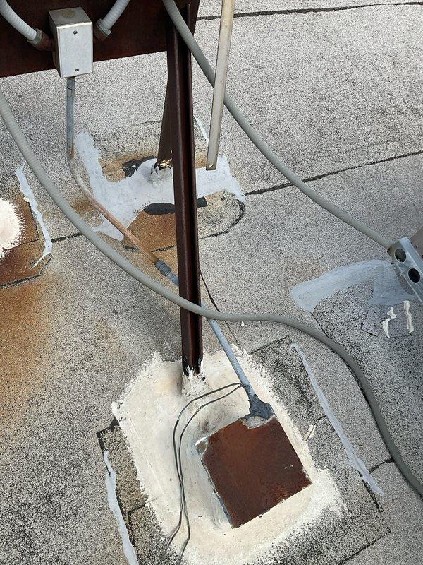 Conducted site assessment for replacement of two rooftop units on commercial property with confirmed roof access. Documented existing RTU installations, refrigerant linesets, electrical disconnects, and roof penetrations to prepare comprehensive replacement estimate.