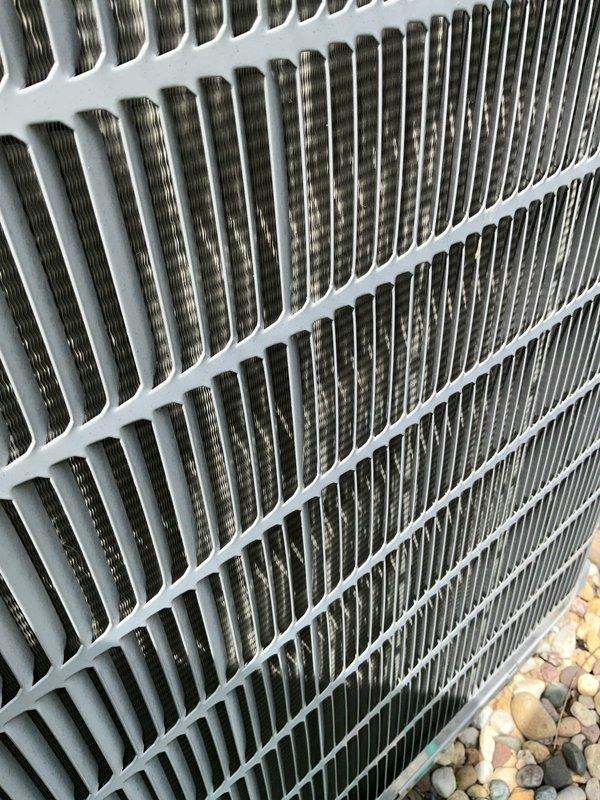 Completed comprehensive air conditioning tune-up service on residential system. Performed standard maintenance procedures including inspection of outdoor condenser unit with verification of fin condition and coil cleanliness, and inspection of air filtration system. All components found to be in satisfactory operating condition with no immediate repairs required at time of service.