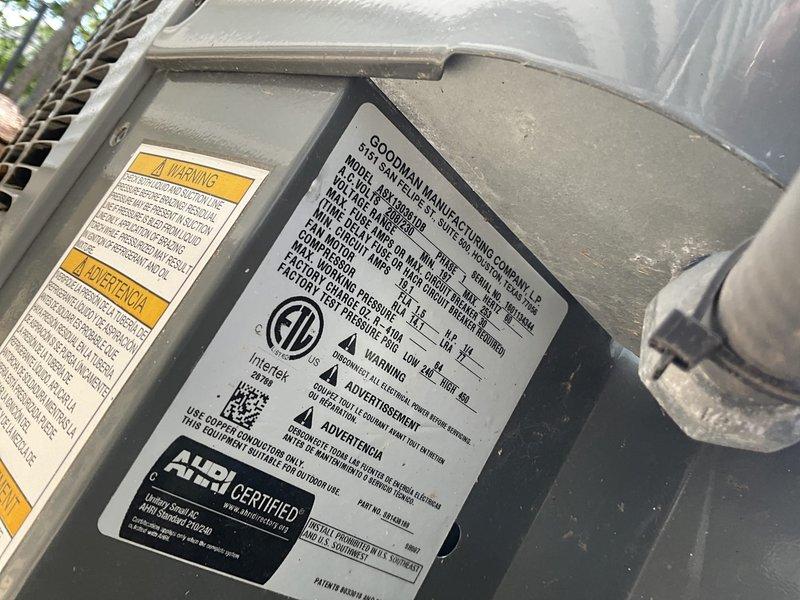 Completed comprehensive AC tune-up service on Goodman outdoor condensing unit as part of recurring maintenance agreement. Performed standard inspection of condenser coils, verified proper fin condition and airflow, documented unit specifications and safety labels, and confirmed system is operating within manufacturer parameters. All components found in satisfactory condition with no immediate repairs required.