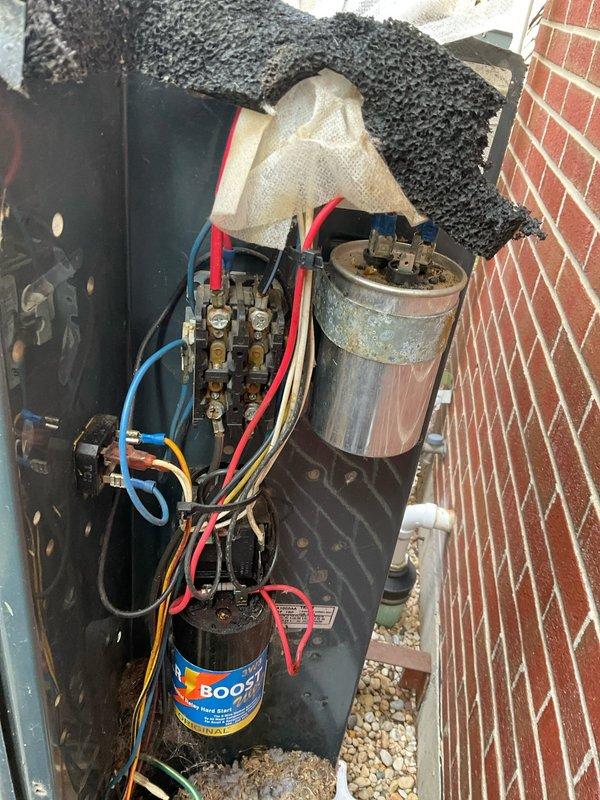 Completed comprehensive BFMA tune-up on 11-year-old air conditioning system. Performed full system inspection revealing significant organic debris accumulation (leaves, twigs, and dirt) in base pan which was removed to prevent drainage issues and maintain proper airflow. Inspected all electrical components including capacitors, contactor, and wiring connections; verified all connections were secure and functioning properly. Cleaned evaporator coil fins and checked refrigerant lines for proper insulation. System tested and operating within normal parameters upon completion.