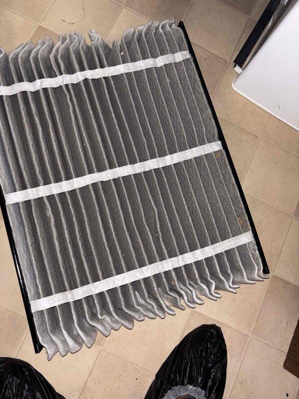 Completed comprehensive BFMA preventive maintenance service on residential HVAC system with equipment over 3 years old. Performed dual AC tune-up procedures on Trane condenser unit, including inspection of compressor operation, refrigerant levels, electrical connections, and condenser coil cleaning. Replaced heavily soiled air cleaner filter which showed significant dust and debris accumulation, restoring proper airflow to the system. Verified all components operating within manufacturer specifications and system ready for continued service.