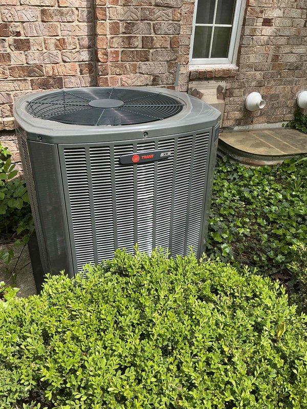 Completed comprehensive BFMA preventive maintenance service on residential HVAC system with equipment over 3 years old. Performed dual AC tune-up procedures on Trane condenser unit, including inspection of compressor operation, refrigerant levels, electrical connections, and condenser coil cleaning. Replaced heavily soiled air cleaner filter which showed significant dust and debris accumulation, restoring proper airflow to the system. Verified all components operating within manufacturer specifications and system ready for continued service.