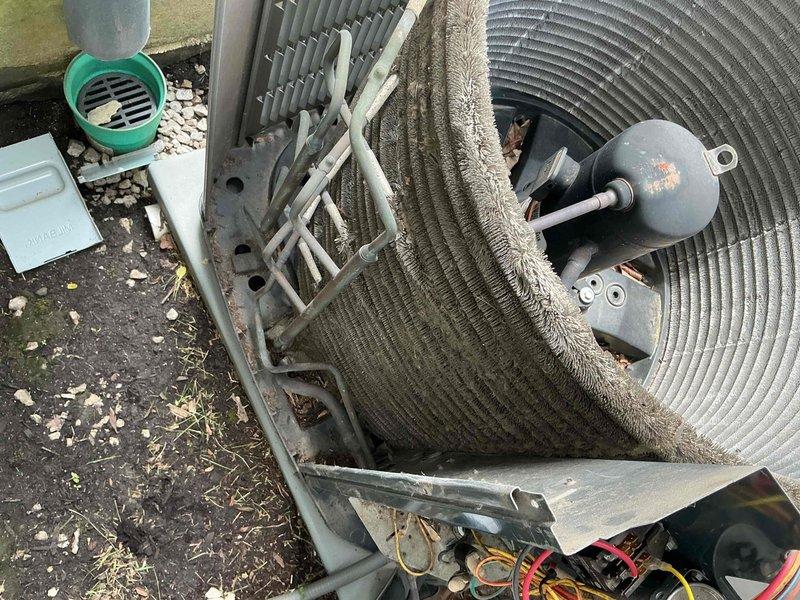 Completed comprehensive BFMA tune-up service on two residential air conditioning systems, both over 9 years old. Performed thorough inspection of outdoor condenser units, noting significant dust, dirt, and debris accumulation on condenser coils and fins requiring cleaning. Evaluated condenser fan motors showing weathered exterior conditions consistent with age and outdoor exposure, verified operational status, and documented equipment specifications. Cleaned condenser coils to restore proper airflow and heat transfer efficiency, inspected refrigerant lines and electrical connections, and confirmed all components functioning within manufacturer specifications upon completion.