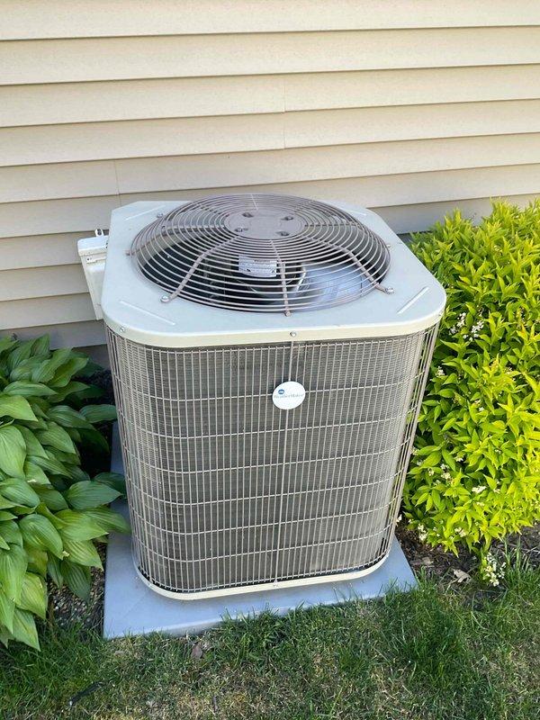 Completed comprehensive BFMA tune-up service on a 1-year-old residential HVAC system consisting of one furnace and one air conditioning unit. Performed full inspection and maintenance on the outdoor condenser unit, which is properly positioned on a concrete pad with adequate clearance and airflow, and verified operational status of all components including compressor, fan motor, and refrigerant levels. Inspected basement furnace installation, checked all mechanical connections, verified proper venting, and confirmed system is functioning within manufacturer specifications with no issues identified at this time.