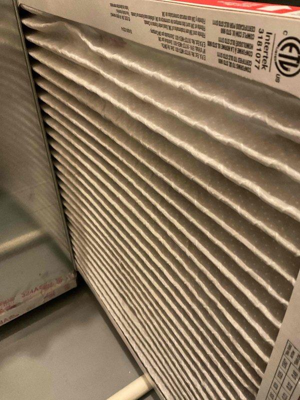 Completed comprehensive BFMA tune-up on 7-year-old air conditioning system. Performed preventive maintenance inspection on outdoor condenser unit, which revealed significant accumulation of dirt, dust, and debris throughout the condenser coil fins requiring thorough cleaning. Serviced both outdoor condenser unit and window-mounted air conditioning unit, ensuring all components were inspected and operational for continued efficient cooling performance.