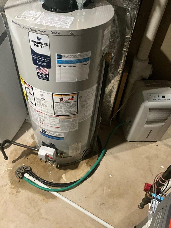 Shut off water supply to home and drained entire plumbing system. Removed and disposed of existing water heater from basement location. Installed new 50-gallon Bradford White gas power vent water heater with 6-year tank warranty, 6-year manufacturer parts warranty, and 1-year labor warranty. Modified and connected all gas lines, water lines, and power vent flue system to ensure code-compliant installation. Replaced failing CPVC ball valve on cold water inlet line with new copper ball valve on existing copper piping as a courtesy upgrade for improved reliability and longevity.