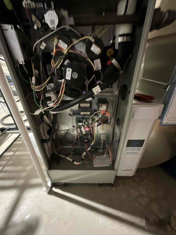 Completed comprehensive BFMA tune-up on a 4+ year old HVAC system, including full inspection of blower motor assembly, gas valve components, control boards, and all electrical connections within the air handler unit. Verified proper operation of all internal components, inspected wiring harnesses and safety controls, and examined water heater connections and copper piping in mechanical closet. All systems tested and operating within normal parameters, with unit properly sealed and returned to service.
