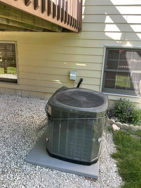 Conducted sales estimate for air conditioning system experiencing significant refrigerant loss. Evaluated existing outdoor condensing unit on concrete pad and indoor evaporator coil assembly with humidifier integration in basement utility area. Recommended complete A/C and coil replacement to address refrigerant deficiency and ensure proper system operation and efficiency.