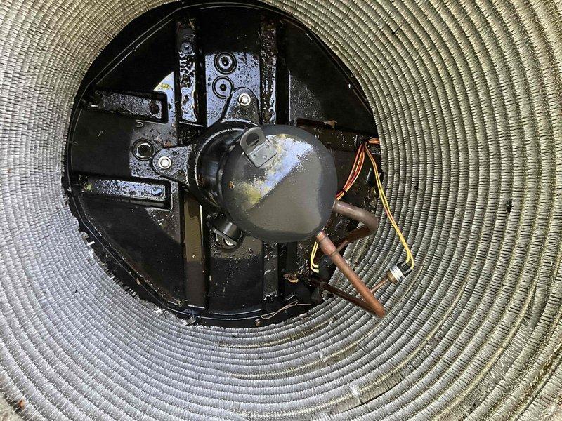 Completed comprehensive BFMA seasonal tune-up on residential air conditioning system. Performed full system inspection including condenser unit evaluation, refrigerant line assessment, and electrical connection verification. Condenser coils showed moderate dust and debris accumulation between fins, which is typical for outdoor units; coils remain structurally sound with no bent fins or damage. Inspected compressor assembly, mounting hardware, and copper refrigerant lines with insulation intact. All mechanical components, wiring connections, and mounting brackets verified secure and operational. System operating within normal parameters with no deficiencies noted.