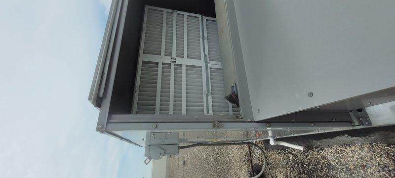 Responded to a commercial HVAC service call for a rooftop unit requiring filter replacement and economizer actuator repair. Replaced the failed economizer actuator that was preventing proper outdoor air control and installed new pleated air filters in the air handling section. Parts and filters were staged at headquarters prior to arrival. Unit tested and verified operational upon completion.