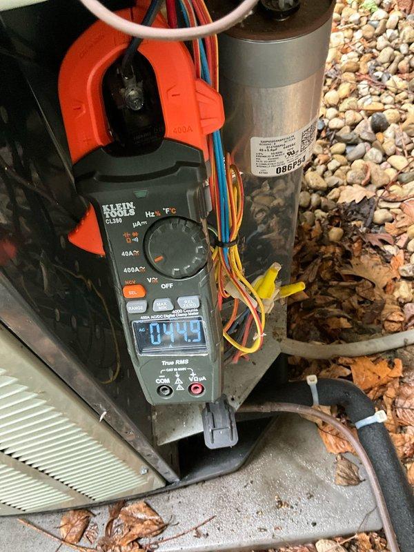 Performed comprehensive BFMA tune-up on 11+ year old air conditioning system during afternoon service window. Upon arrival, found outdoor condenser unit heavily contaminated with cottonwood seeds, dirt, and organic debris significantly restricting airflow through coil fins. Thoroughly cleaned condenser coils to restore proper heat transfer efficiency and airflow capacity. Performed electrical diagnostics using clamp meter, recording amperage readings to verify compressor operation within manufacturer specifications. Inspected capacitor, wiring connections, and refrigerant lines for proper condition and secure terminations. System operational and performing efficiently following tune-up completion.