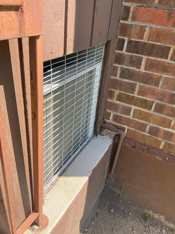 Completed comprehensive BFMA tune-up service on 7-year-old HVAC system including full AC performance evaluation and mold inspection. Accessed exterior ventilation grille and interior air handler unit, performed standard maintenance procedures, verified proper airflow through ductwork, inspected condensate drainage system and refrigerant lines, and confirmed no mold growth present in system components or surrounding areas.