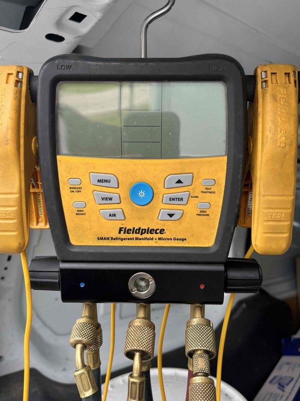 Completed comprehensive AC tune-up on 9-year-old residential cooling system during mid-morning service window. Performed thorough inspection of evaporator coil assembly, verified refrigerant pressures and system operation using calibrated manifold gauges, and documented equipment condition through detailed photography. All components tested within normal operating parameters with no immediate repairs required.