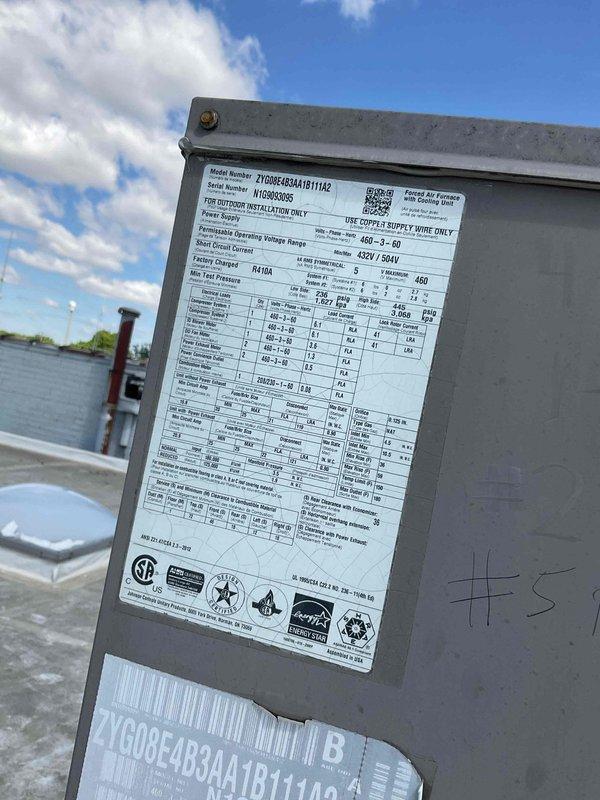 Performed comprehensive inspection and service on multiple commercial rooftop units at client facility. Documented equipment specifications, model numbers, and operational parameters for 7-8 RTU systems across the building's gravel-surfaced roof. All units assessed for performance and maintenance requirements.