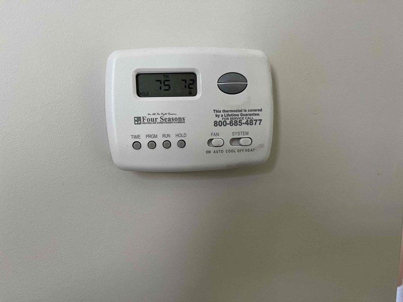 Completed comprehensive BFMA tune-up service on 6-year-old HVAC system including both air conditioning and furnace components. Performed full system inspection, verified air filter condition and proper installation in air handler unit, tested thermostat operation and temperature calibration with Four Seasons digital control displaying accurate readings at 75 degrees. Confirmed all mechanical components, ductwork connections, and system controls functioning properly with no issues identified during maintenance visit.