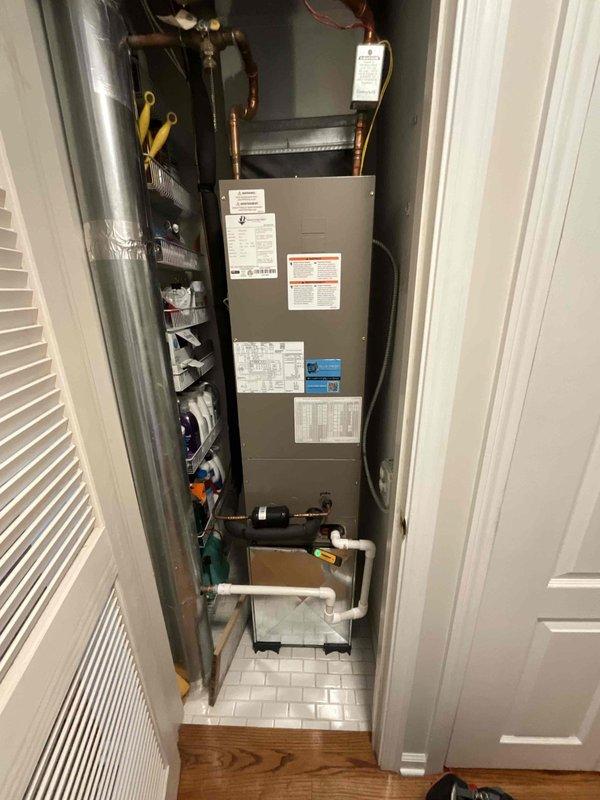 Completed comprehensive AC tune-up on rooftop unit for system over 3 years old, accessing equipment via ladder per homeowner arrangement. Performed full system inspection including electrical measurements with clamp meter, verified refrigerant line connections with service ports, inspected indoor air handler unit with condensate drainage system, and documented all components. All systems found operating within normal parameters with no deficiencies noted.