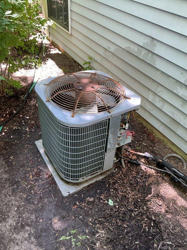Completed comprehensive BFMA tune-up service on 14+ year old residential HVAC system, including air conditioning condenser unit inspection and maintenance. Performed standard maintenance procedures on outdoor condensing unit with cylindrical configuration, inspected refrigerant lines, verified proper operation of fan assembly, and checked electrical connections. Conducted furnace service as part of recurring maintenance program to ensure system reliability and optimal performance for the upcoming heating season.