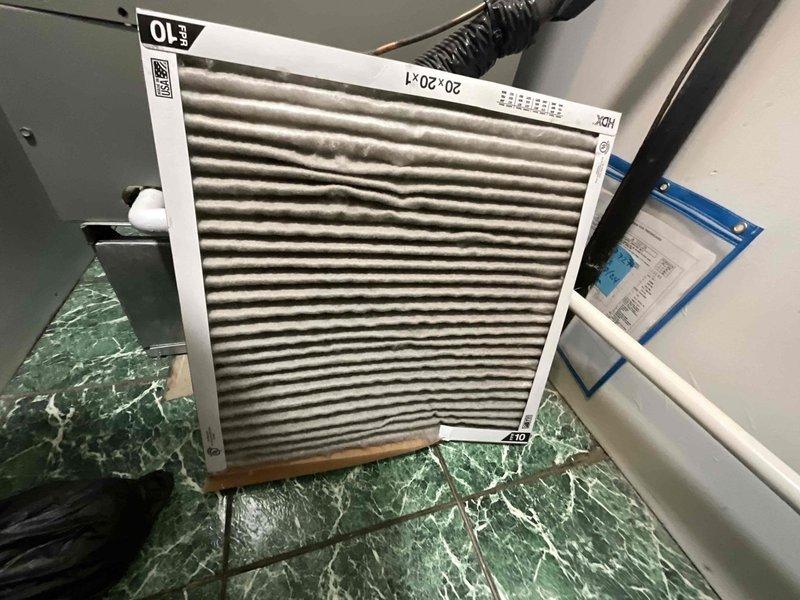 Completed comprehensive BFMA tune-up on rooftop-mounted air conditioning unit over 8 years old during morning service window. Performed full system inspection with access panel removal to evaluate internal components including capacitor, contactor, and electrical connections. Inspected refrigerant lines, verified proper wiring connections, and assessed overall unit operation. Replaced heavily soiled 20x20x1 pleated air filter that showed significant dust and debris accumulation, which was restricting airflow and reducing system efficiency. All components found to be functioning within normal parameters following tune-up procedures.