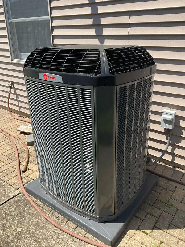 Completed comprehensive BFMA tune-up service on residential Trane outdoor condensing unit. Performed standard preventive maintenance protocol including system inspection, coil cleaning, electrical connection verification, refrigerant line assessment, and operational testing. Unit found in good working condition with proper clearances maintained; all components functioning within manufacturer specifications upon completion of service.