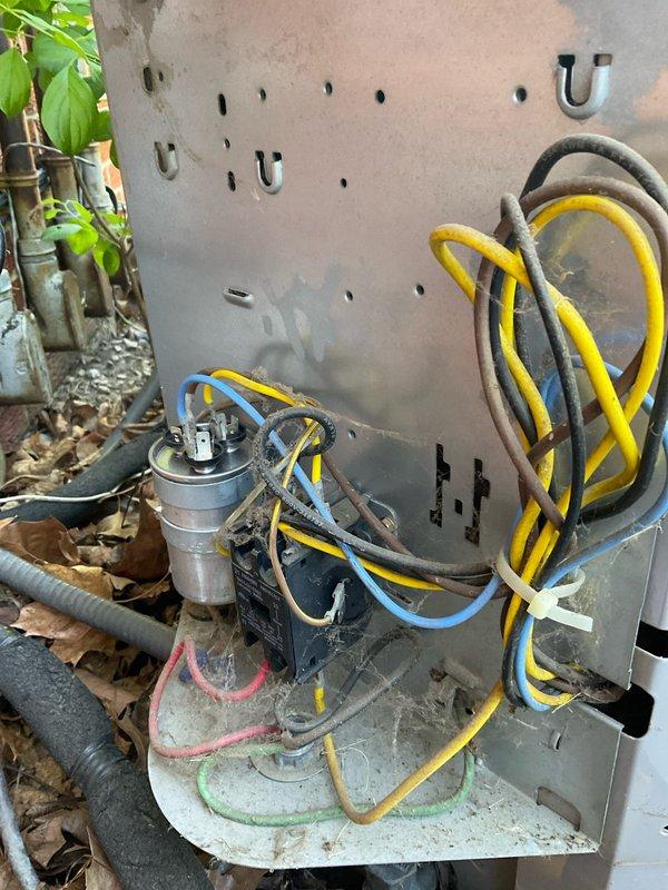Responded to tenant complaint regarding poor air conditioning performance in apartment unit. Upon arrival, performed comprehensive system inspection and tune-up service. Discovered heavily soiled air filter with significant dust accumulation restricting airflow, which was the primary cause of reduced cooling efficiency. Replaced dirty filter with new unit to restore proper system operation. Inspected outdoor condensing unit, verified all electrical connections were secure with proper wire management and zip ties in place. Checked refrigerant lines, compressor operation, and capacitor functionality—all components found to be in good working condition. System now operating within normal parameters and ready for upcoming warm weather season.