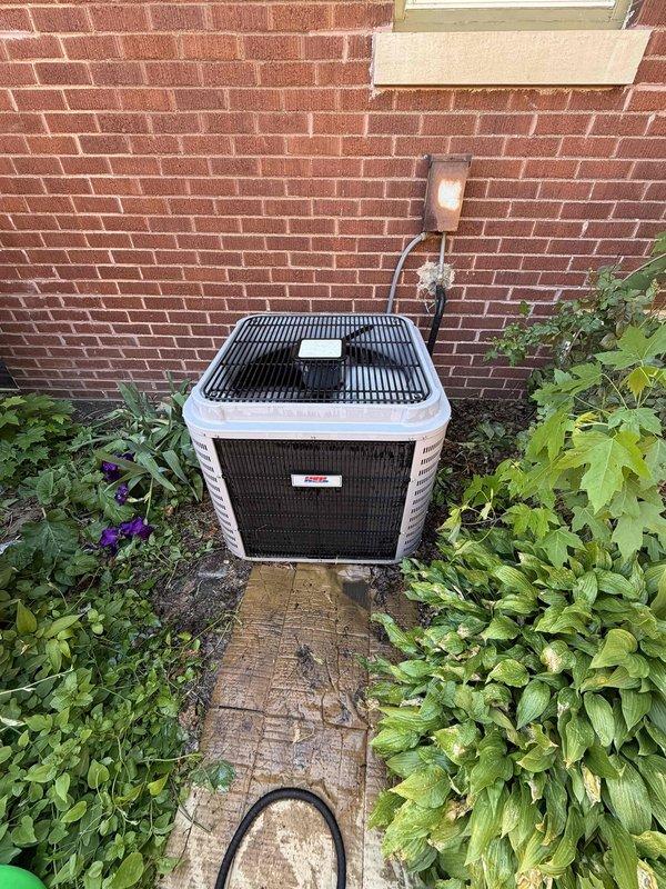 Completed comprehensive BFMA tune-up service on a 13-year-old residential air conditioning system. Performed full system inspection of outdoor condensing unit, including evaluation of electrical components, refrigerant lines, and overall equipment condition. Unit was found to be operating within normal parameters with proper airflow through condenser coil and protective grille intact.