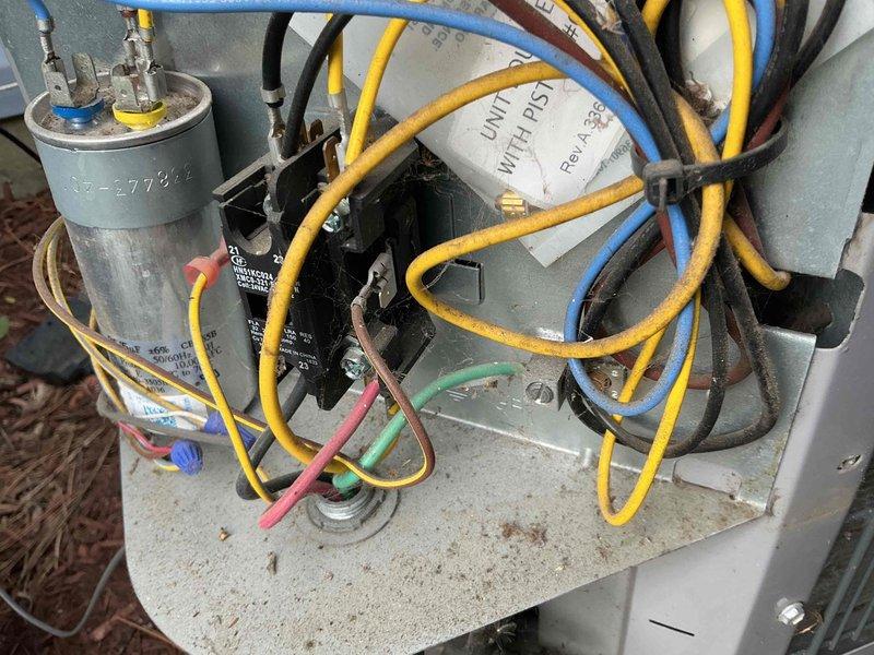 Completed comprehensive BFMA tune-up on 1-year-old residential heat pump system. Performed electrical diagnostics using digital multimeter, verified capacitor functionality and all electrical connections, tested system operation and temperature readings which showed 352°F discharge temperature. All components inspected and found operating within normal parameters; system running efficiently with no deficiencies noted.