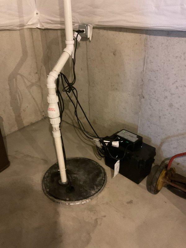 Completed comprehensive BFMA tune-up service on 8-year-old Lennox air conditioning system during second scheduled visit following weather delay from initial appointment. Performed full AC maintenance protocol including inspection of outdoor condensing unit, verified proper operation of electrical disconnect, checked refrigerant levels, cleaned condenser coils, inspected condensate drainage system with white PVC piping, and evaluated overall system performance. All components found operating within manufacturer specifications with unit cycling properly and maintaining adequate airflow through ventilation louvers.