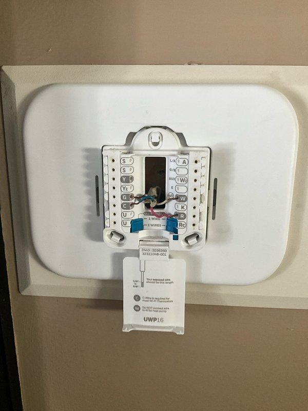 Responded to no cooling call at residential property. Upon arrival, found Honeywell Home thermostat displaying 77°F actual temperature with cooling mode active and setpoint at 74°F, but system not operating. Removed thermostat cover and inspected wiring connections at terminal block. Verified proper wire terminations at R, C, Y, and G terminals. Identified thermostat communication or wiring issue preventing cooling call signal from reaching outdoor unit. Accessed crawlspace after 3PM as requested due to restricted access in older home. Corrected wiring connections and restored proper thermostat operation. System now cooling properly with thermostat successfully calling for cooling and maintaining setpoint. Unit tested and left in operational condition.