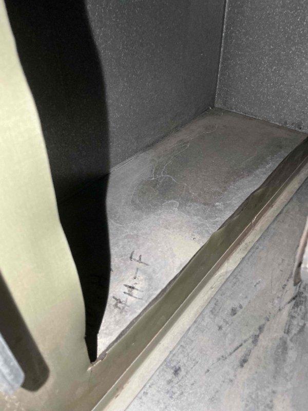 Completed comprehensive BFMA tune-up service on outdoor air conditioning unit. Performed standard preventative maintenance protocol including inspection of electrical connections, capacitor testing, wire condition assessment, and evaluation of compressor housing integrity. Unit showed significant age-related weathering with visible corrosion on electrical components and metal casing; documented existing conditions with photographic evidence for service records. All electrical connections verified secure, system operational upon completion of tune-up procedures.