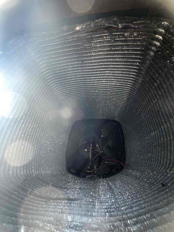 Completed comprehensive BFMA tune-up service on residential air conditioning system over 2 years old. Performed thorough inspection of evaporator coil assembly, condenser unit, and heat exchanger components, confirming proper fin alignment and adequate airflow through coil sections. Verified refrigerant lines and copper tubing connections are secure with no visible signs of leakage, checked condensate drain pan for proper drainage function, and documented system condition through photographic records showing clean coil surfaces with normal condensation present during operation.