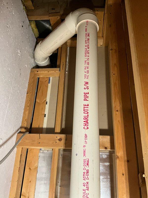Completed comprehensive plumbing inspection as part of preventative maintenance tune-up service. Inspected basement plumbing infrastructure including PVC drainage system with multiple vertical standpipes, floor drains, and associated piping secured with rubber couplings and hose clamps. Verified proper installation of Charlotte Pipe Schedule 40 PVC components meeting ASTM D1785 specifications, examined pipe connections and support framing, and assessed drainage system for proper function and potential issues.