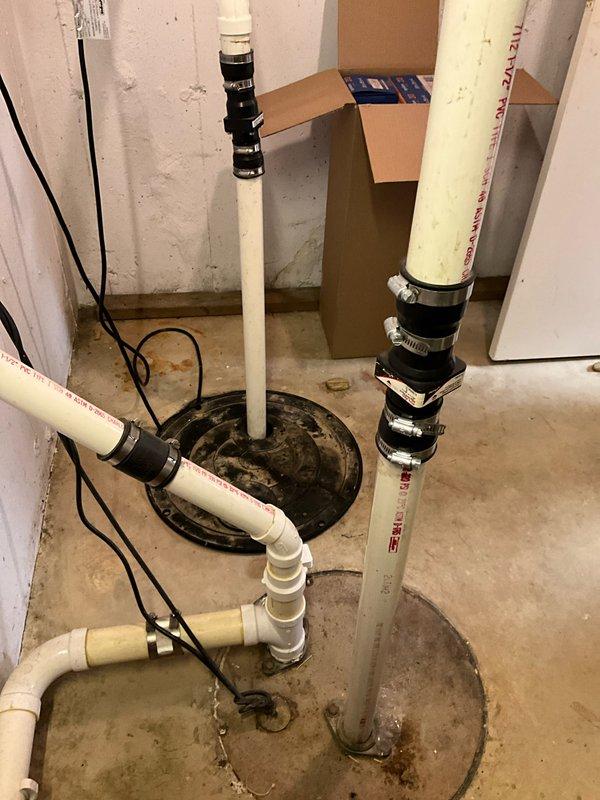 Completed comprehensive plumbing inspection as part of preventative maintenance tune-up service. Inspected basement plumbing infrastructure including PVC drainage system with multiple vertical standpipes, floor drains, and associated piping secured with rubber couplings and hose clamps. Verified proper installation of Charlotte Pipe Schedule 40 PVC components meeting ASTM D1785 specifications, examined pipe connections and support framing, and assessed drainage system for proper function and potential issues.