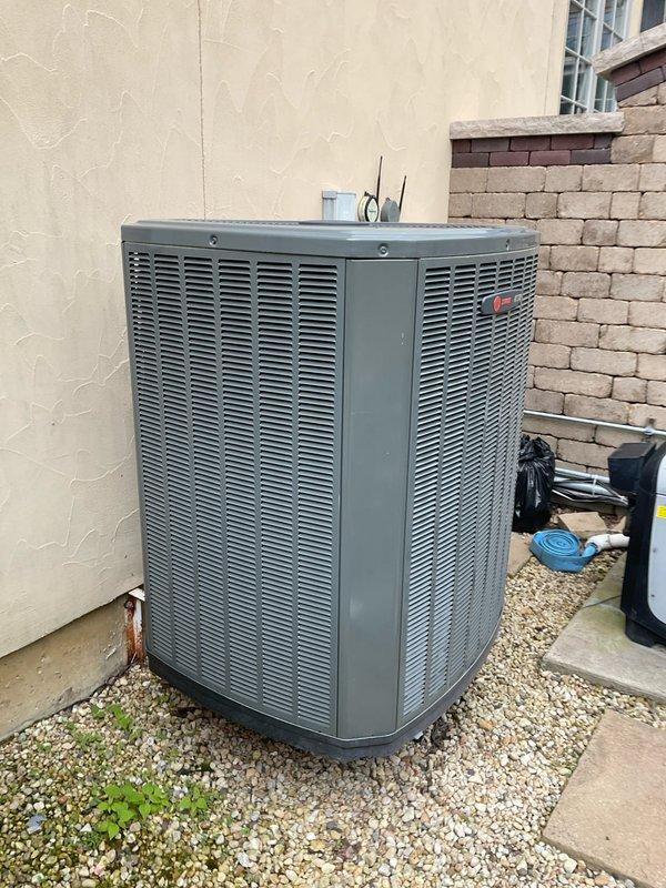 Completed comprehensive BFMA tune-up maintenance on two residential furnace systems, both approximately 3-4 years old. Performed full system inspection of outdoor condenser unit located in side yard area, verifying proper operation and clearances. Inspected and documented air filtration system with clean mesh filter in place, confirming adequate airflow and proper installation. All equipment operating within normal parameters upon completion of scheduled maintenance.