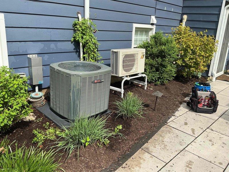 Completed comprehensive BFMA tune-up service on 7-year-old residential HVAC system including outdoor cylindrical AC unit and mini-split heat pump condenser. Performed standard preventive maintenance procedures, inspected both units for proper operation, and replaced heavily soiled air filter that showed significant dust and debris accumulation throughout the pleated media. All equipment operating within normal parameters upon completion of service.