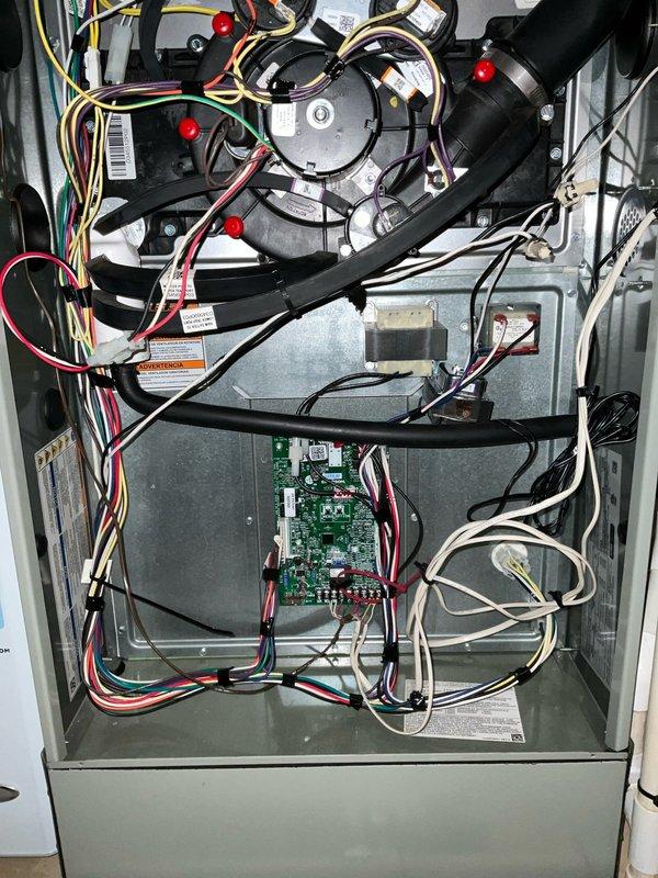 Installed ozone-free air scrubber system into existing HVAC unit. Mounted electronic air purification module with blue LED indicator to interior panel, integrated control board with existing system wiring using proper wire management and zip ties, and verified all electrical connections for proper operation.