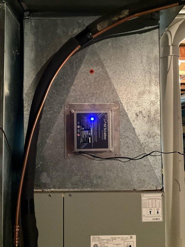 Installed ozone-free air scrubber system into existing HVAC unit. Mounted electronic air purification module with blue LED indicator to interior panel, integrated control board with existing system wiring using proper wire management and zip ties, and verified all electrical connections for proper operation.