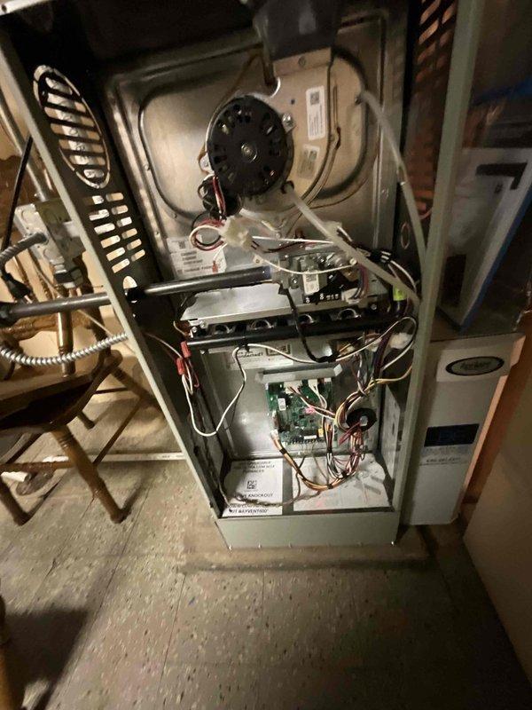 Completed comprehensive BFMA tune-up service on residential HVAC system with equipment over 2 years old. Performed thorough inspection of furnace unit including blower motor assembly, electrical connections, control board, gas valve components, and ignition system. Verified all internal components are properly wired and secured, checked blower motor operation and mounting bracket integrity, inspected electrical conduit and ground wire connections, and confirmed all safety labels and warning stickers are visible and intact. System tested and operating within normal parameters with all components functioning correctly.