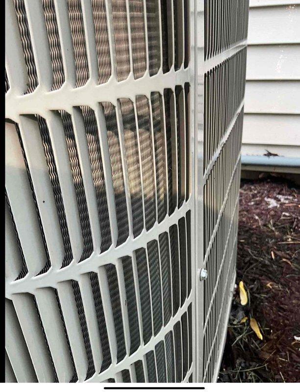 Completed comprehensive BFMA tune-up on aging Bryant outdoor condensing unit (15+ years old). Performed full system inspection, cleaned condenser coils showing accumulated dust and debris on metal fins, verified electrical connections at disconnect box, and tested operational performance. Unit operating within normal parameters upon completion of preventive maintenance service.
