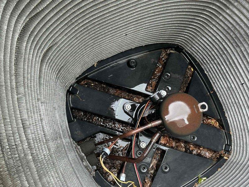 Completed comprehensive Blue Frost Membership Advantage tune-up on residential HVAC system. Performed full system inspection including blower assembly and motor components, documenting Genteq motor model D15C020A020 (208-230V, 50/60Hz) with visible corrosion on mounting brackets and hardware requiring monitoring for future replacement. All electrical connections, wiring, and capacitor tested and verified operational; system cleaned and returned to service in proper working condition.