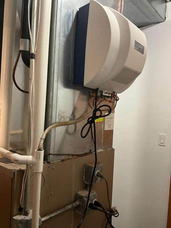 Responded to no cooling complaint on R-22 residential system with frozen evaporator coil. Upon arrival, confirmed inadequate cooling and weak airflow as reported. Diagnosed frozen coil condition, allowed system to thaw completely, and performed comprehensive system evaluation including airflow assessment, refrigerant charge verification, and inspection of indoor and outdoor components. Identified root cause of freezing condition, made necessary repairs to restore proper system operation, and verified adequate cooling performance upon completion.