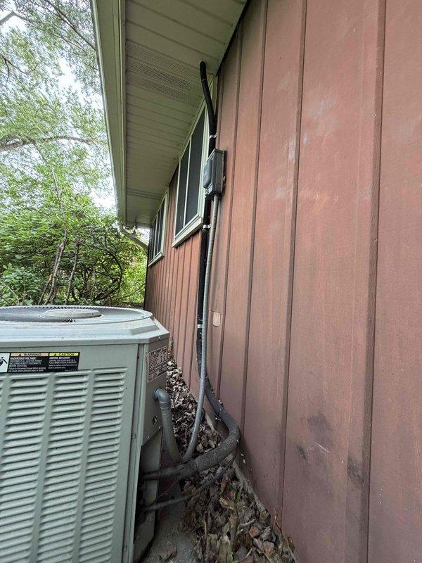 Completed comprehensive BFMA tune-up service on a 23-year-old residential air conditioning system. Performed full system inspection of outdoor condenser unit, including evaluation of refrigerant lines, electrical connections, and overall equipment condition. All components were assessed and photographed for documentation purposes, with unit found to be operational at time of service.