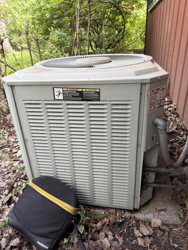 Completed comprehensive BFMA tune-up service on a 23-year-old residential air conditioning system. Performed full system inspection of outdoor condenser unit, including evaluation of refrigerant lines, electrical connections, and overall equipment condition. All components were assessed and photographed for documentation purposes, with unit found to be operational at time of service.
