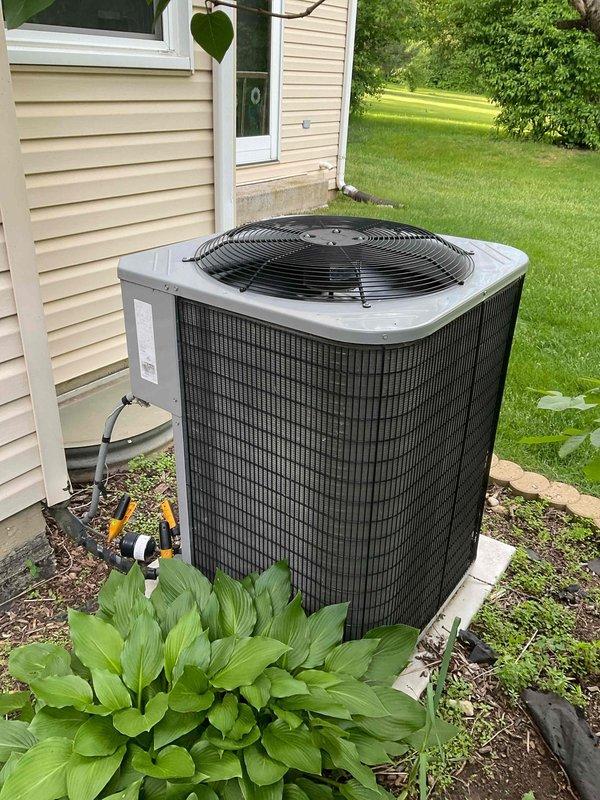 Responded to service call for air conditioning system experiencing icing on refrigerant lines and loss of cooling capacity. Performed comprehensive BFMA tune-up on 12-year-old system including inspection of outdoor condenser unit, verification of proper airflow around equipment, and assessment of refrigerant line conditions. System had been shut down by homeowner with fan left running after ice formation was observed on lines the previous afternoon. Conducted full diagnostic evaluation, checked refrigerant levels, inspected coil condition, verified electrical connections, and tested system operation to restore proper cooling function and prevent future icing issues.
